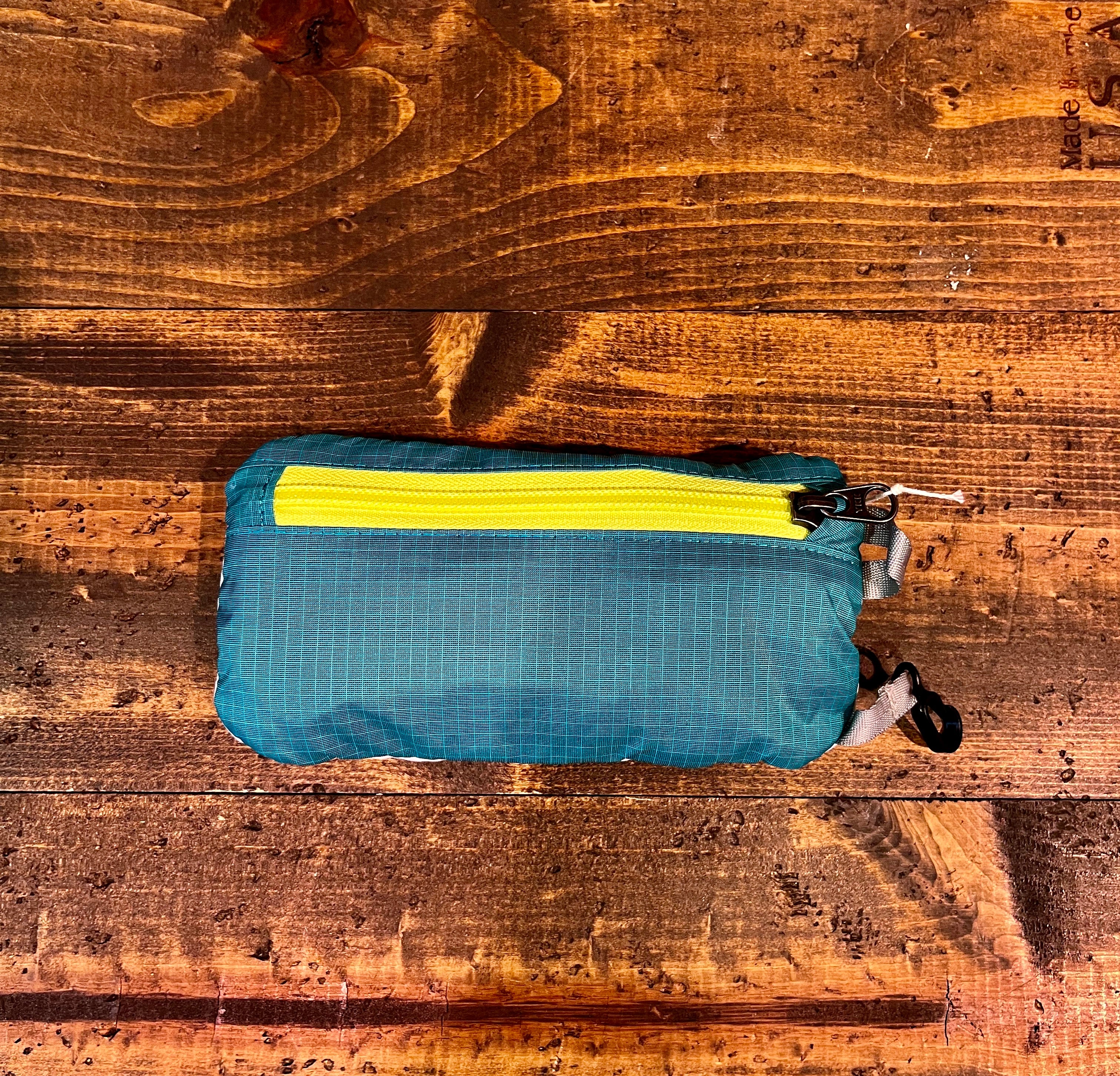 Ultralight Black Hole Mini Hip Pack - Subtidal Blue – ASHER Ultralight Black Hole Mini Hip Pack - Subtidal Blue – ASHER